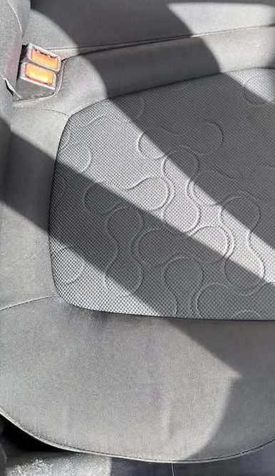 Cloth seat, before and after cleaning (after)