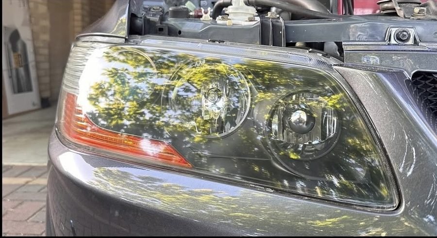 Cloudy headlight, before and after restoration (after)