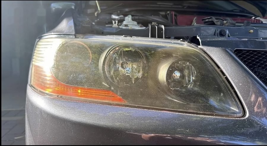 Cloudy headlight, before and after restoration (before)