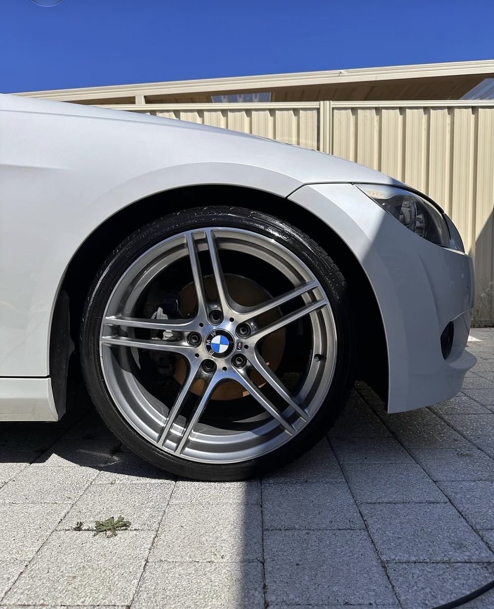 Clean BMW alloy wheel and dressed tyre